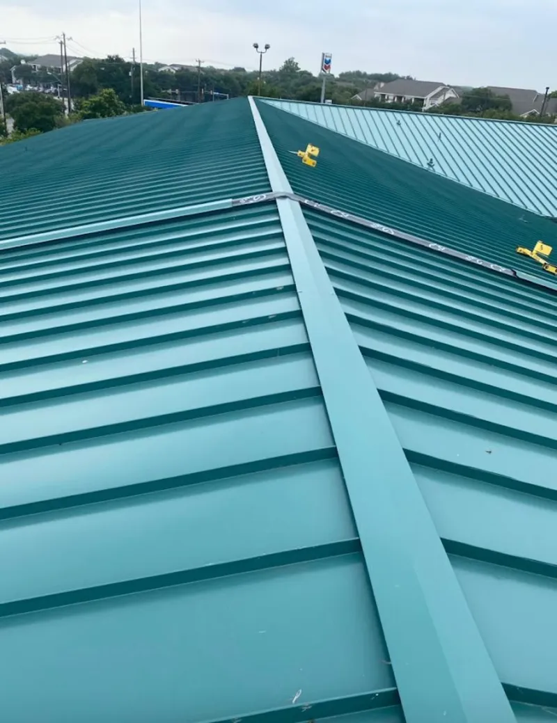 Green commercial metal roof ridge and valley for Metal Roof Repair in Osprey